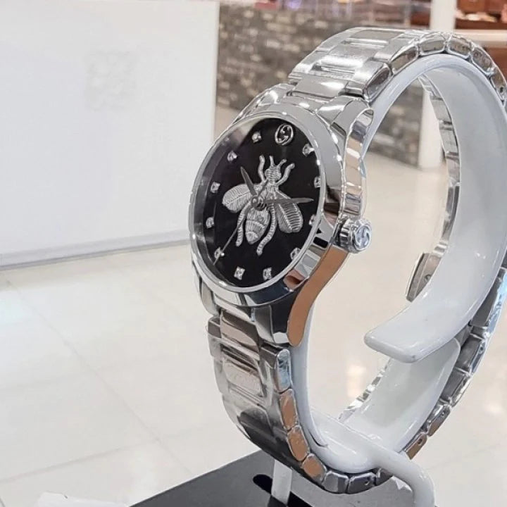 Shop Authentic Gucci G Timeless Quartz Diamonds Black Dial Silver Steel Strap Watch For Women - YA1265024 - Luxxuri