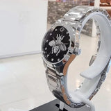  Shop Authentic Gucci G Timeless Quartz Diamonds Black Dial Silver Steel Strap Watch For Women - YA1265024 - Luxxuri