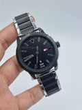  Shop Authentic Tommy Hilfiger Sneaker Quartz Black Dial Two Tone Steel Strap Watch for Men - 1791619 - Luxxuri