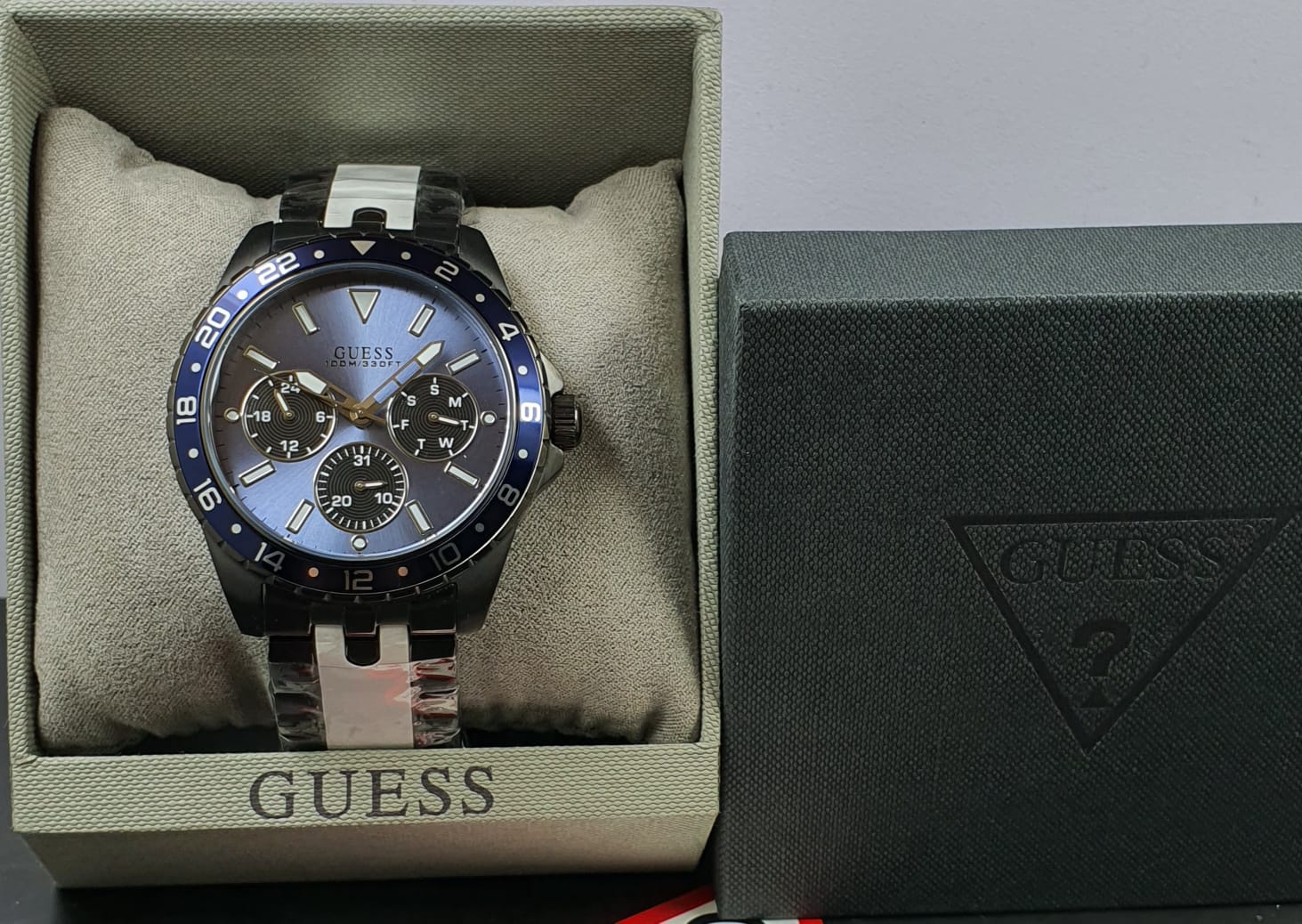  Shop Authentic Guess Odyssey Quartz Blue Dial Gunmetal Steel Strap Watch For Men - W1107G5 - Luxxuri