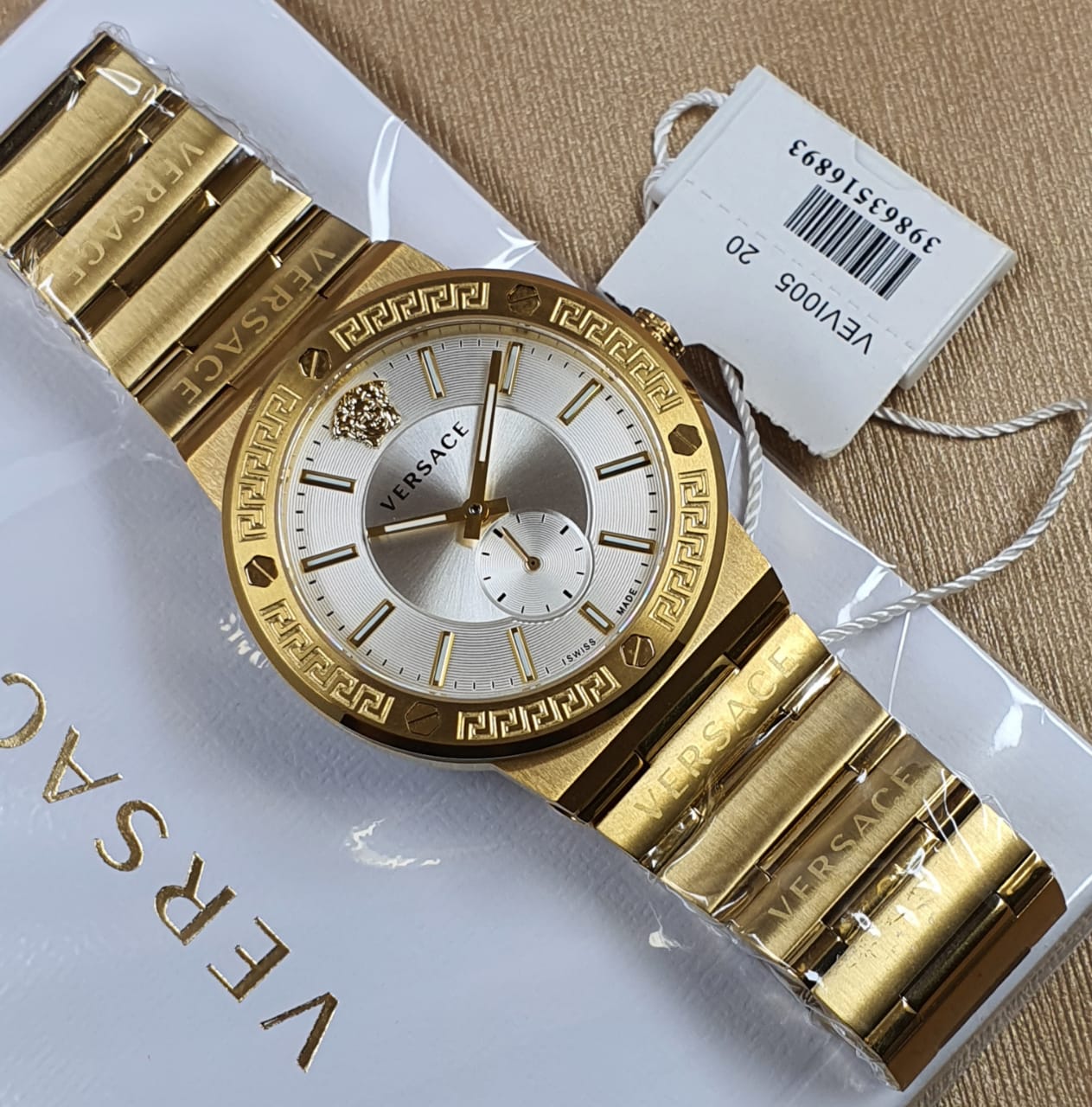  Shop Authentic Versace Greca Silver Dial Gold Steel Strap Watch for Men - VEVI00520 - Luxxuri