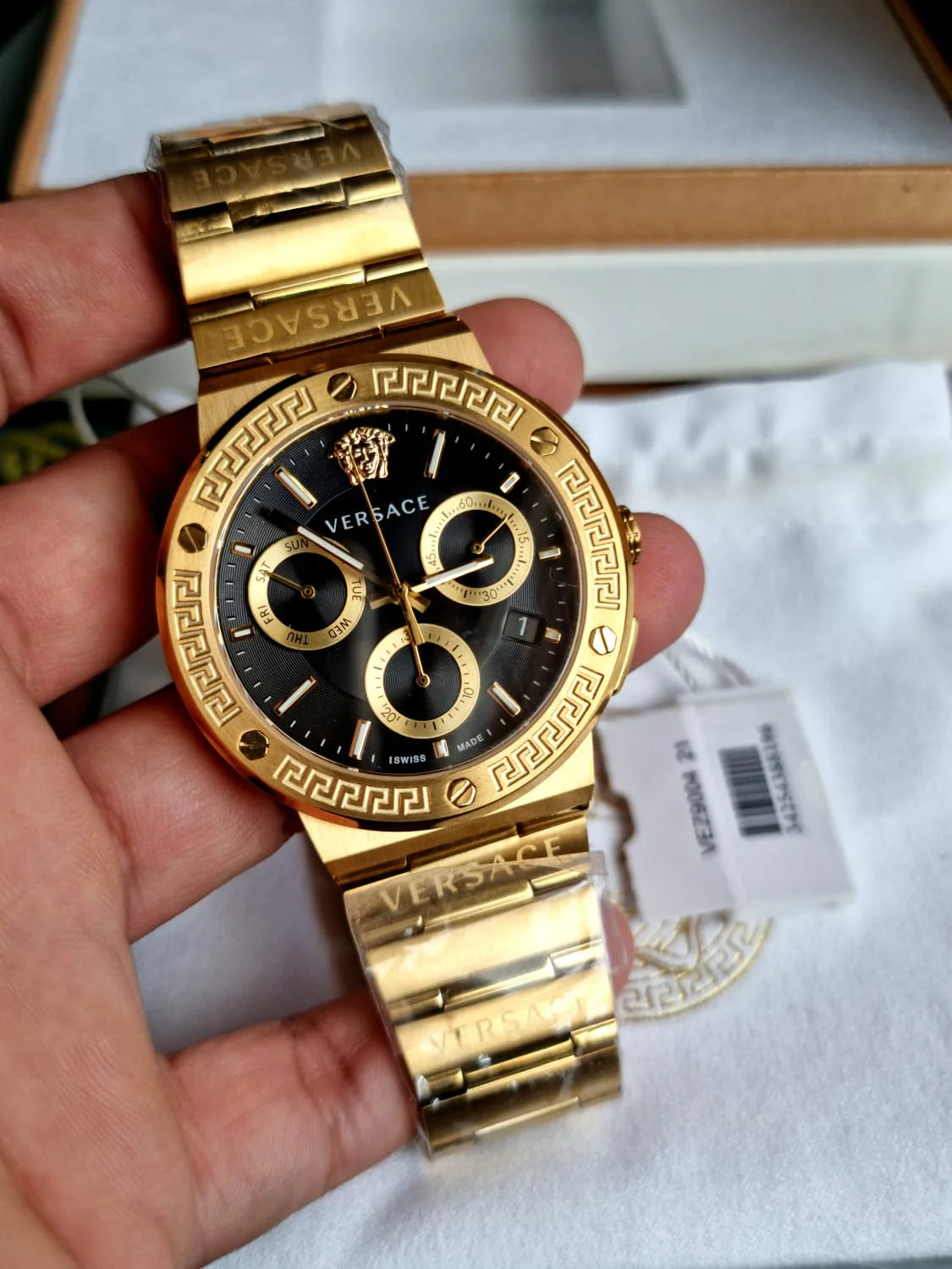  Shop Authentic Versace Greca Chronograph Black Dial Gold Steel Strap Watch For Men - VEZ900421 - Luxxuri