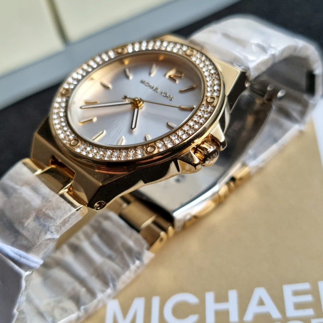  Shop Authentic Michael Kors Lennox Three-Hand Silver Dial Gold Steel Strap Watch For Women - MK7278 - Luxxuri