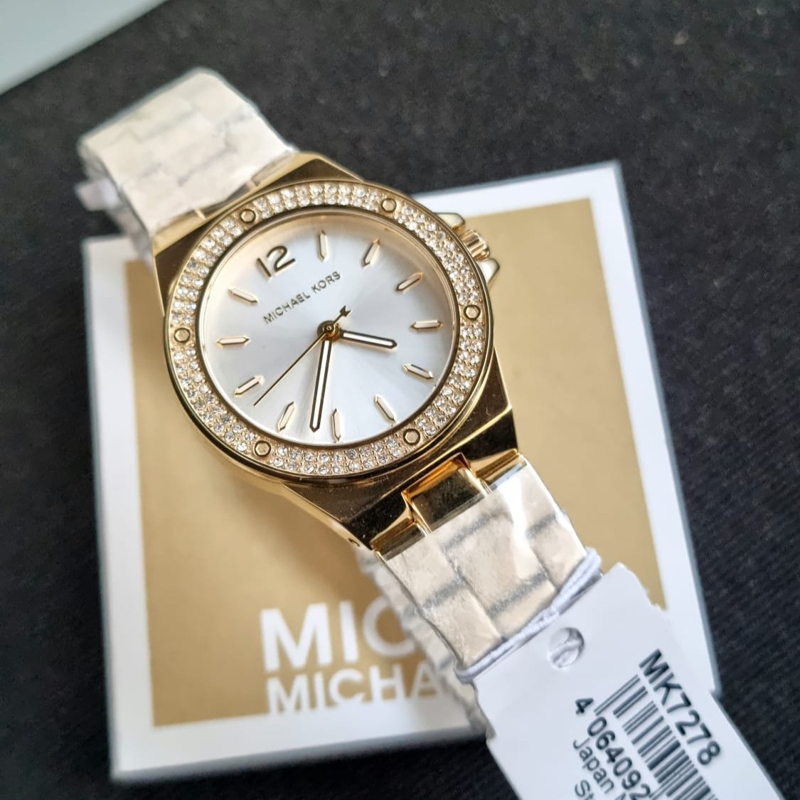  Shop Authentic Michael Kors Lennox Three-Hand Silver Dial Gold Steel Strap Watch For Women - MK7278 - Luxxuri