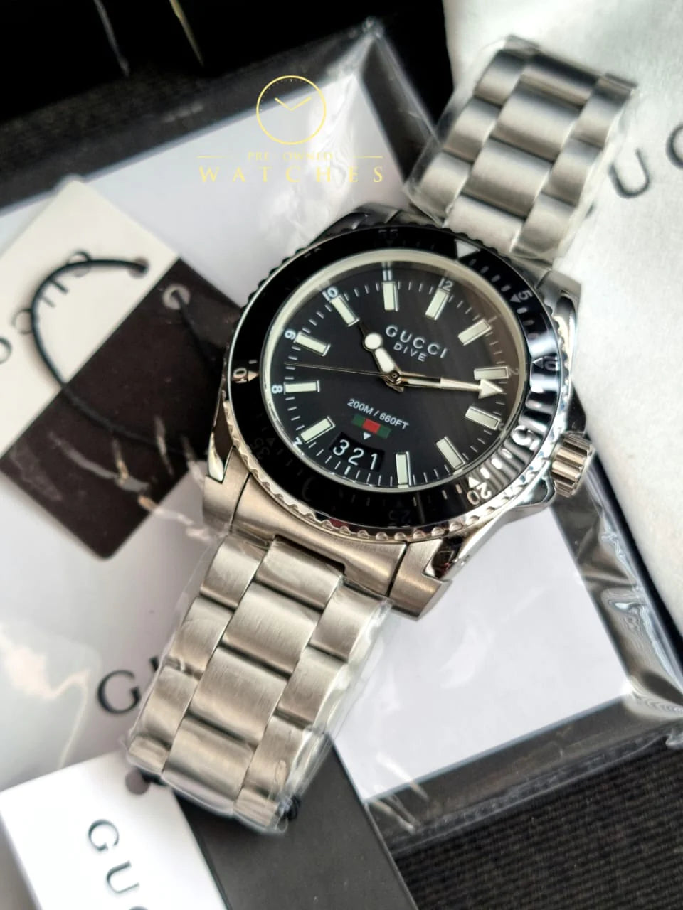  Shop Authentic Gucci Dive Quartz Black Dial Silver Steel Strap Watch For Men - YA136301A - Luxxuri