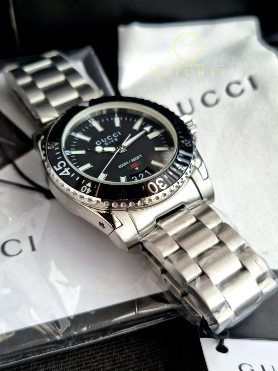  Shop Authentic Gucci Dive Quartz Black Dial Silver Steel Strap Watch For Men - YA136301A - Luxxuri