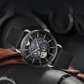  Shop Authentic Emporio Armani Meccanico Skeleton Black Dial Black Leather Strap Watch For Men - AR60026 - Luxxuri