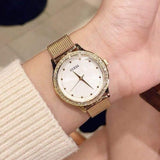  Shop Authentic Guess Chelsea Mother of Pearl White Dial Gold Mesh Strap Watch For Women - W0647L3 - Luxxuri
