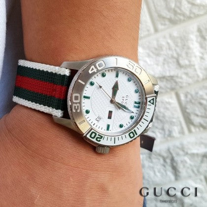  Shop Authentic Gucci G Timeless White Dial Two Tone Nylon Strap Watch For Men - YA126231 - Luxxuri