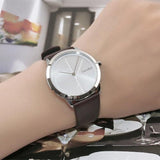  Shop Authentic Calvin Klein Minimal Silver Dial Black Leather Strap Watch for Men - K3M221CY - Luxxuri