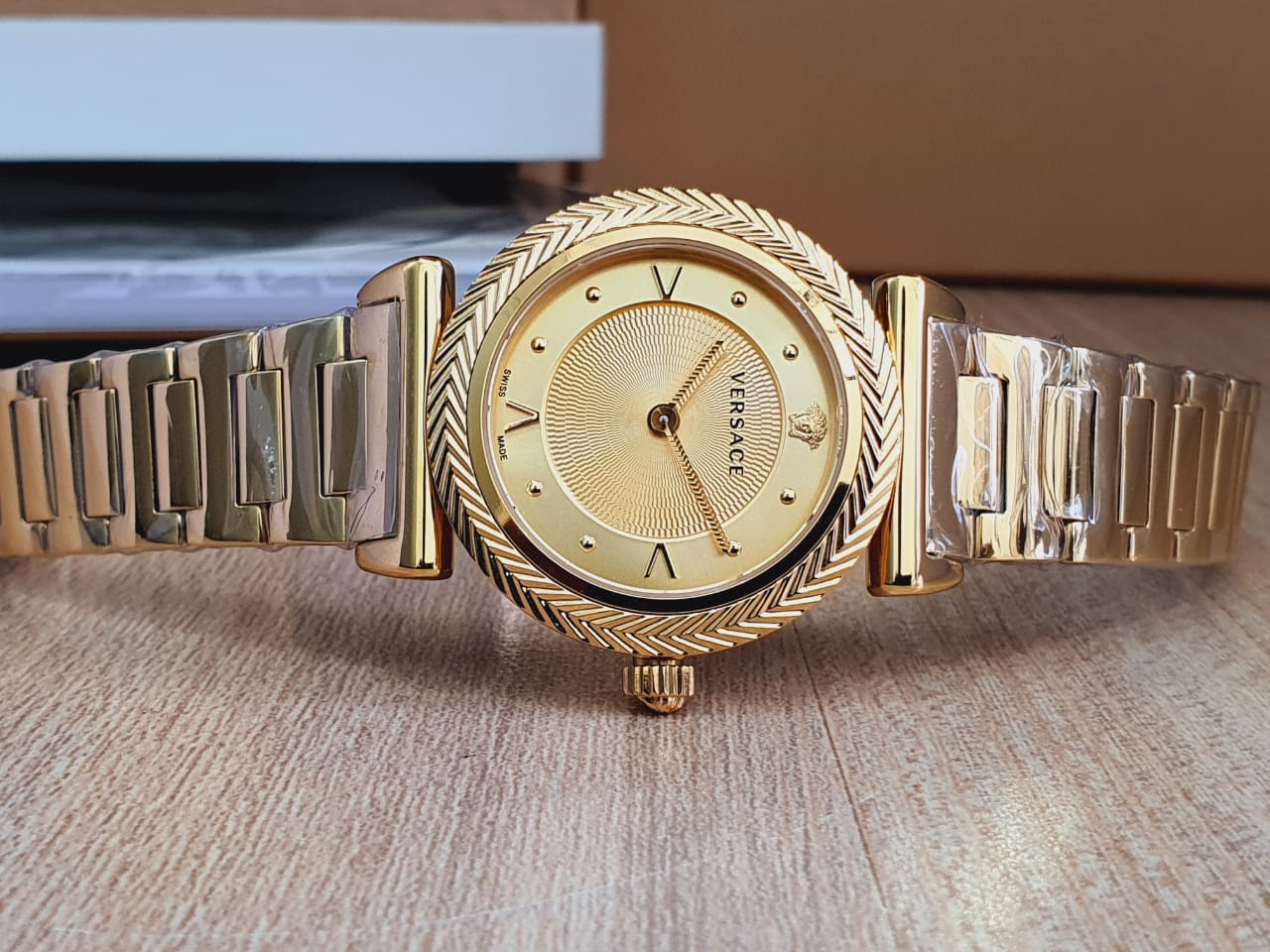  Shop Authentic Versace V-Motif Gold Dial Gold Steel Strap Watch for Women - VERE00618 - Luxxuri