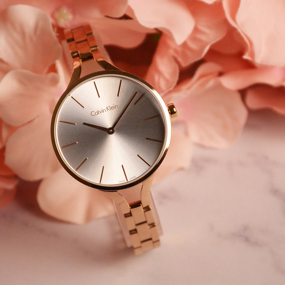 Shop Authentic Calvin Klein Graphic Silver Dial Rose Gold Steel Strap Watch for Women - K7E23646 - Luxxuri