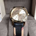  Shop Authentic Burberry The City Gold Dial Black Leather Strap Watch for Men - BU9032 - Luxxuri