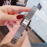  Shop Authentic Guess Nouveau Diamonds Silver Dial Silver Mesh Bracelet Watch for Women - W0127L1 - Luxxuri