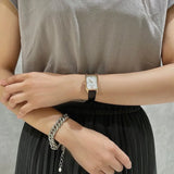 Shop Authentic Emporio Armani Gioia Quartz Mother of Pearl Dial Black Leather Strap Watch For Women - AR11390 - Luxxuri