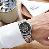  Shop Authentic Emporio Armani Meccanico Automatic Skeleton Black Dial Silver Steel Strap Watch For Men - AR60021 - Luxxuri