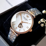  Shop Authentic Emporio Armani Meccanico Automatic Mother of Pearl Dial Two Tone Steel Strap Watch For Women - AR60049 - Luxxuri