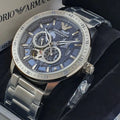  Shop Authentic Emporio Armani Mario Chronograph Automatic Blue Dial Silver Steel Strap Watch For Men - AR60052 - Luxxuri
