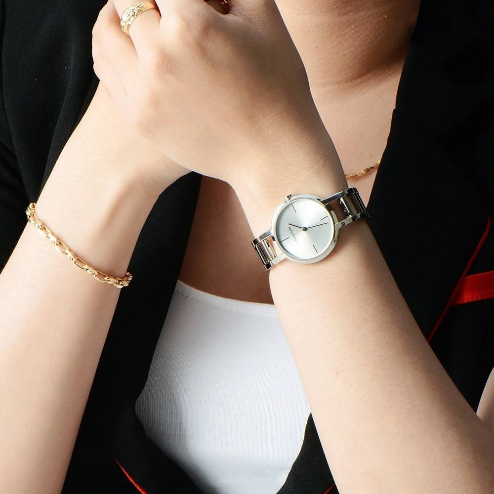  Shop Authentic Calvin Klein Wavy Silver Dial Silver Steel Strap Watch for Women - K9U23146 - Luxxuri