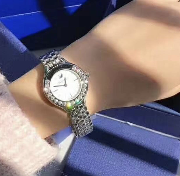  Shop Authentic Swarovski Lovely Crystals Mini White Dial Silver Steel Strap Watch for Women - 5242901 - Luxxuri