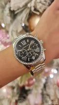  Shop Authentic Michael Kors Lexington Chronograph Black Dial Silver Steel Strap Watch For Women - MK7277 - Luxxuri