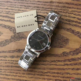  Shop Authentic Burberry The City Black Dial Silver Steel Strap Watch for Women - BU9101 - Luxxuri