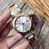  Shop Authentic Burberry The City White Dial Gold Steel Strap Watch for Women - BU9103 - Luxxuri