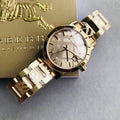  Shop Authentic Burberry The City Gold Dial Gold Steel Strap Watch for Women - BU9145 - Luxxuri