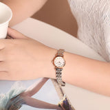  Shop Authentic Emporio Armani Mother of Pearl Dial Two Tone Steel Strap Watch For Women - AR1689 - Luxxuri