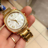 Shop Authentic Michael Kors Byrn Quartz Gold Dial Gold Steel Strap Watch For Women - MK6134 - Luxxuri