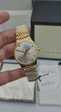  Shop Authentic Gucci G Timeless Quartz Silver Dial Gold Steel Strap Watch For Women - YA1264155 - Luxxuri
