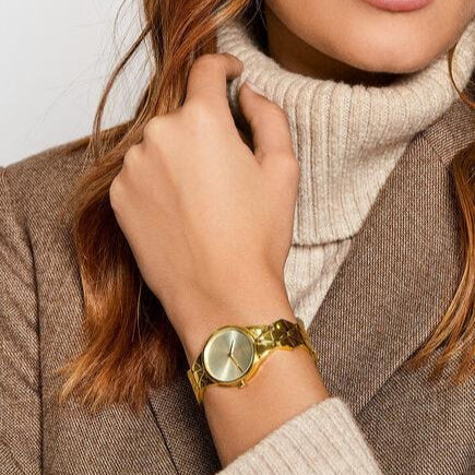  Shop Authentic Calvin Klein Snake Silver Dial Yellow Gold Steel Strap Watch For Women - K6E23546 - Luxxuri