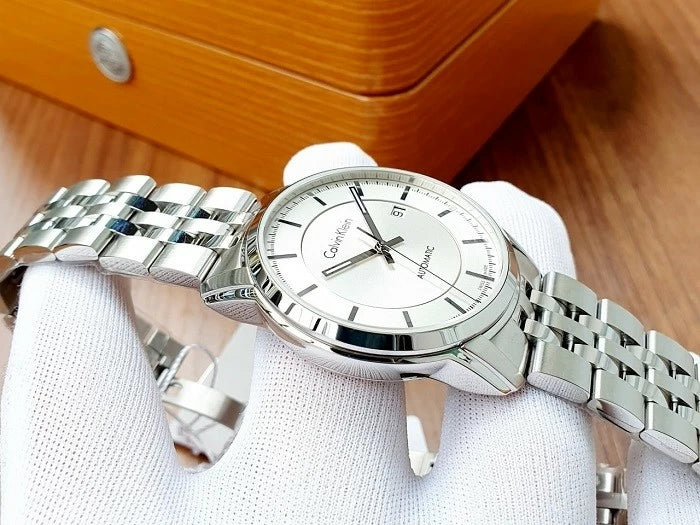  Shop Authentic Calvin Klein Infinity Automatic Silver Dial Silver Steel Strap Watch for Men - K5S34146 - Luxxuri