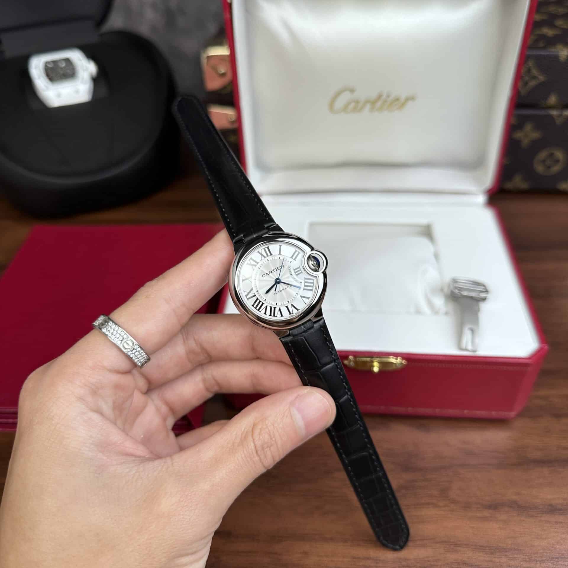  Shop Authentic Cartier Ballon Bleu De Cartier Silver Dial Black Leather Strap Watch for Women - WSBB0030 - Luxxuri