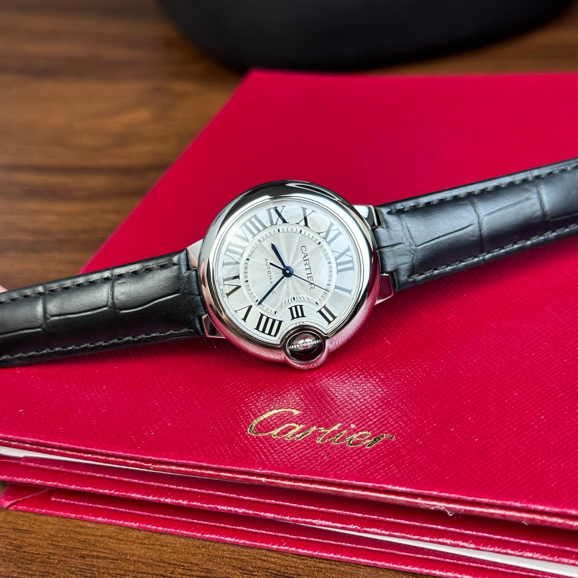  Shop Authentic Cartier Ballon Bleu De Cartier Silver Dial Black Leather Strap Watch for Women - WSBB0030 - Luxxuri