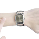  Shop Authentic Gucci G Brown Square Brown Dial Silver Steel Strap Watch For Women - YA125402 - Luxxuri