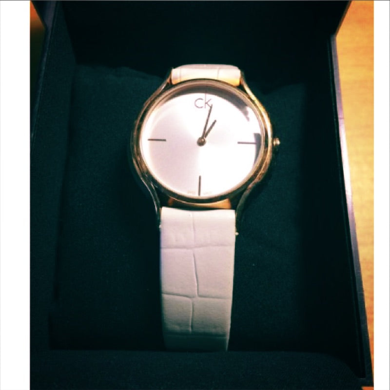  Shop Authentic Calvin Klein Skirt White Dial White Leather Strap Watch for Women - K2U236K6 - Luxxuri
