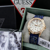  Shop Authentic Guess Swirl Analog Quartz White Dial Blue Rubber Strap Watch for Women - W1096L4 - Luxxuri