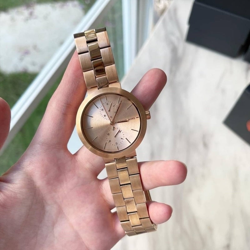  Shop Authentic Michael Kors Garner Quartz Rose Gold Dial Rose Gold Steel Strap Watch For Women - MK6409 - Luxxuri