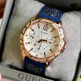  Shop Authentic Guess Swirl Analog Quartz White Dial Blue Rubber Strap Watch for Women - W1096L4 - Luxxuri