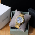  Shop Authentic Guess Mini Sunrise Quartz Blue Dial Gold Steel Strap Watch For Women - W0448L6 - Luxxuri