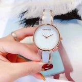  Shop Authentic Calvin Klein Seduce White Dial Two Tone Steel Strap Watch for Women - K4E2N616 - Luxxuri