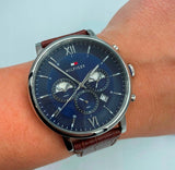  Shop Authentic Tommy Hilfiger Evan Chronograph Blue Dial Brown Leather Strap Watch for Men - 1710393 - Luxxuri