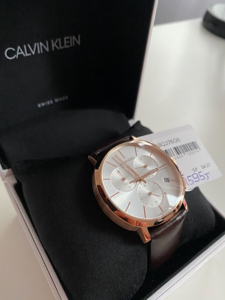  Shop Authentic Calvin Klein Posh Chronograph White Dial Brown Leather Strap Watch for Men - K8Q376G6 - Luxxuri