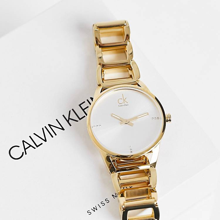  Shop Authentic Calvin Klein Stately Silver Dial Gold Steel Strap Watch for Women - K3G23526 - Luxxuri