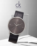  Shop Authentic Calvin Klein Grey Dial Black Leather Strap Watch for Women - K2Y2Y1CU - Luxxuri
