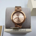  Shop Authentic Michael Kors Garner Quartz Rose Gold Dial Rose Gold Steel Strap Watch For Women - MK6409 - Luxxuri