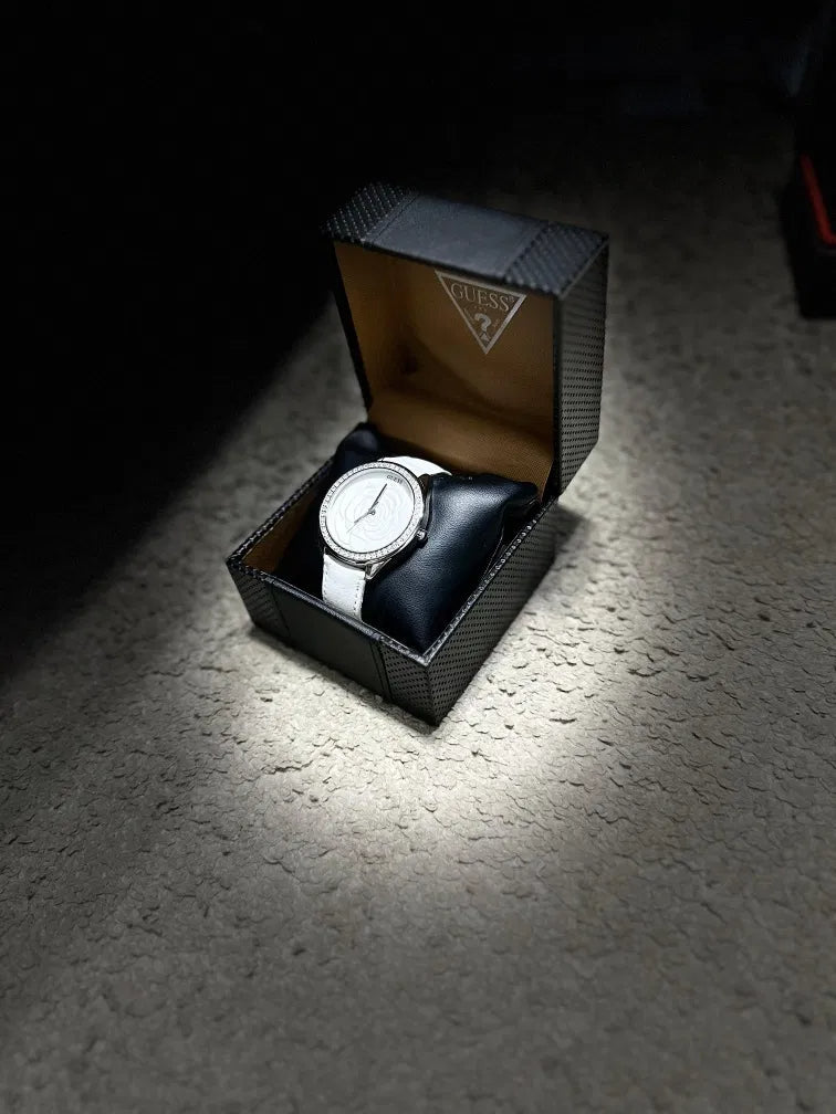  Shop Authentic Guess Rosette Analog White Dial White Leather Strap Watch For Women - W75043L1 - Luxxuri