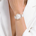  Shop Authentic Swarovski Crystalline Aura Silver Dial White Leather Strap Watch for Women - 5519453 - Luxxuri