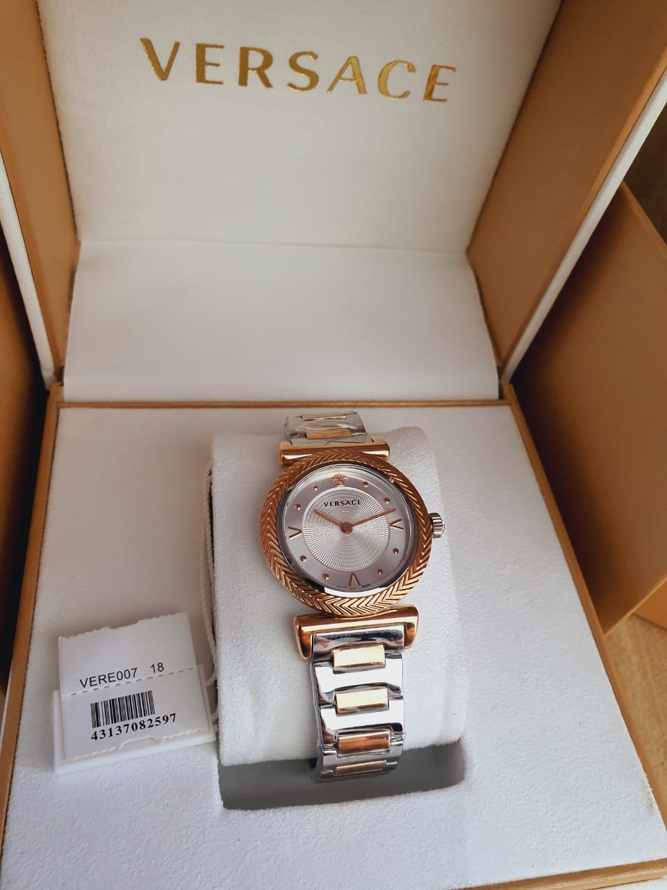  Shop Authentic Versace V-Motif Silver Dial Two Tone Steel Strap Watch for Women - VERE00718 - Luxxuri